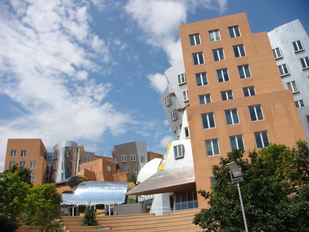 MIT's Stata Center under a blue sky