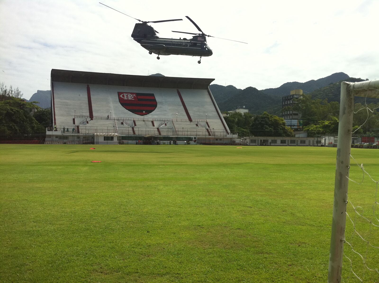 Crowd watching as President Obama's helicopter lands at Flamengo's grounds